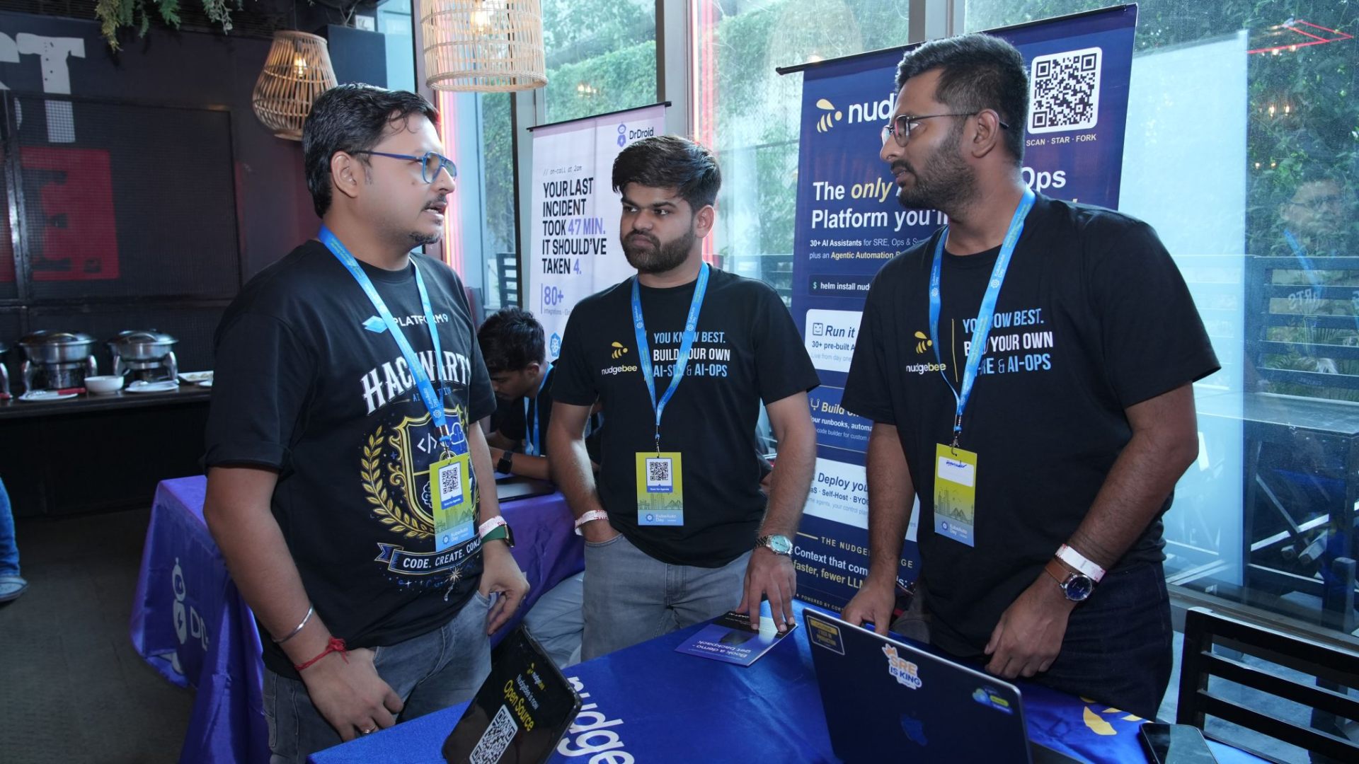 Sponsors at the nudgebee and DrDroid booths