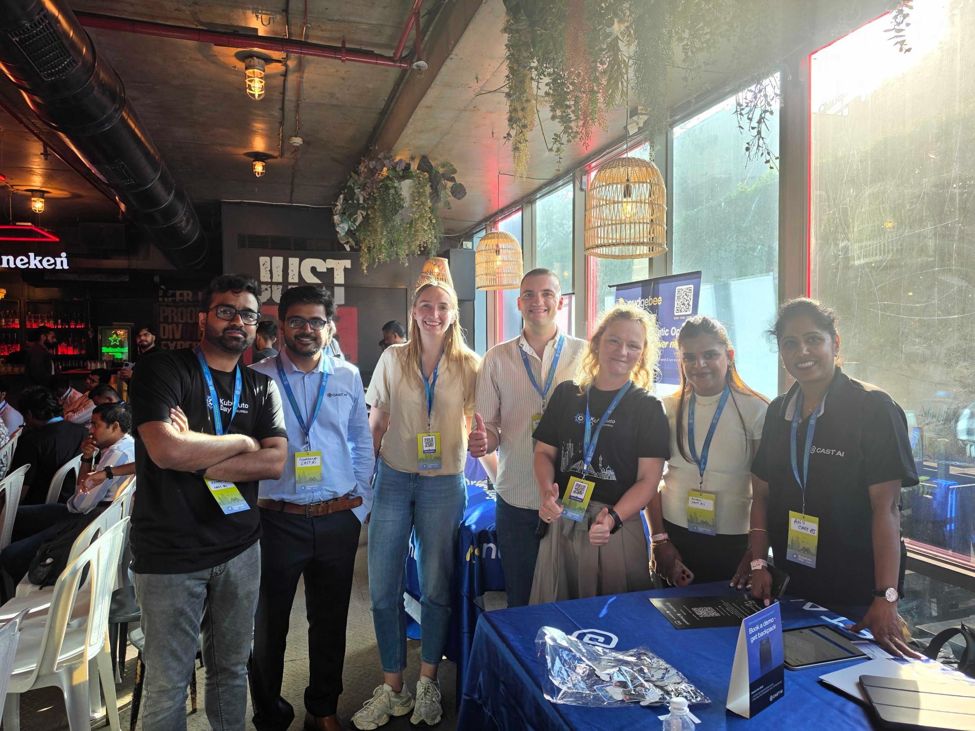 Sponsor team at the Cast AI booth