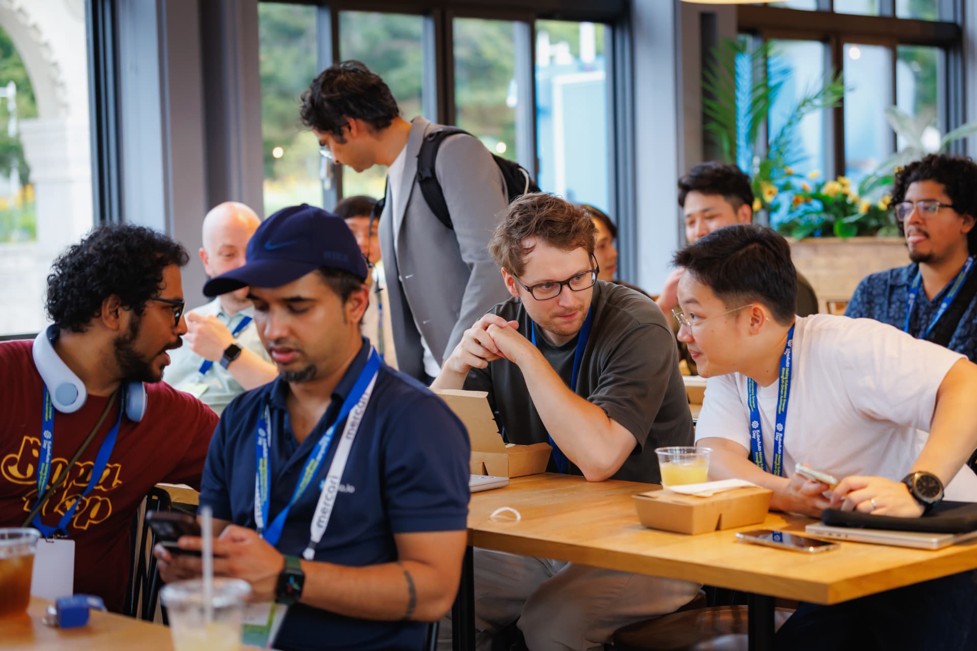 Attendees networking over food and drinks