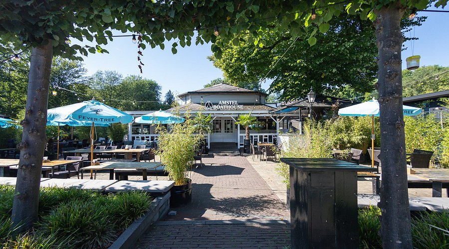 Amstel Boathouse exterior with outdoor seating